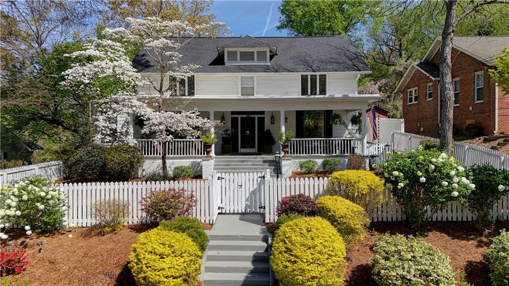 211 East 11th Street Southeast Rome, GA 30161 - Photo 1 of 1 a front view of a house with a garden