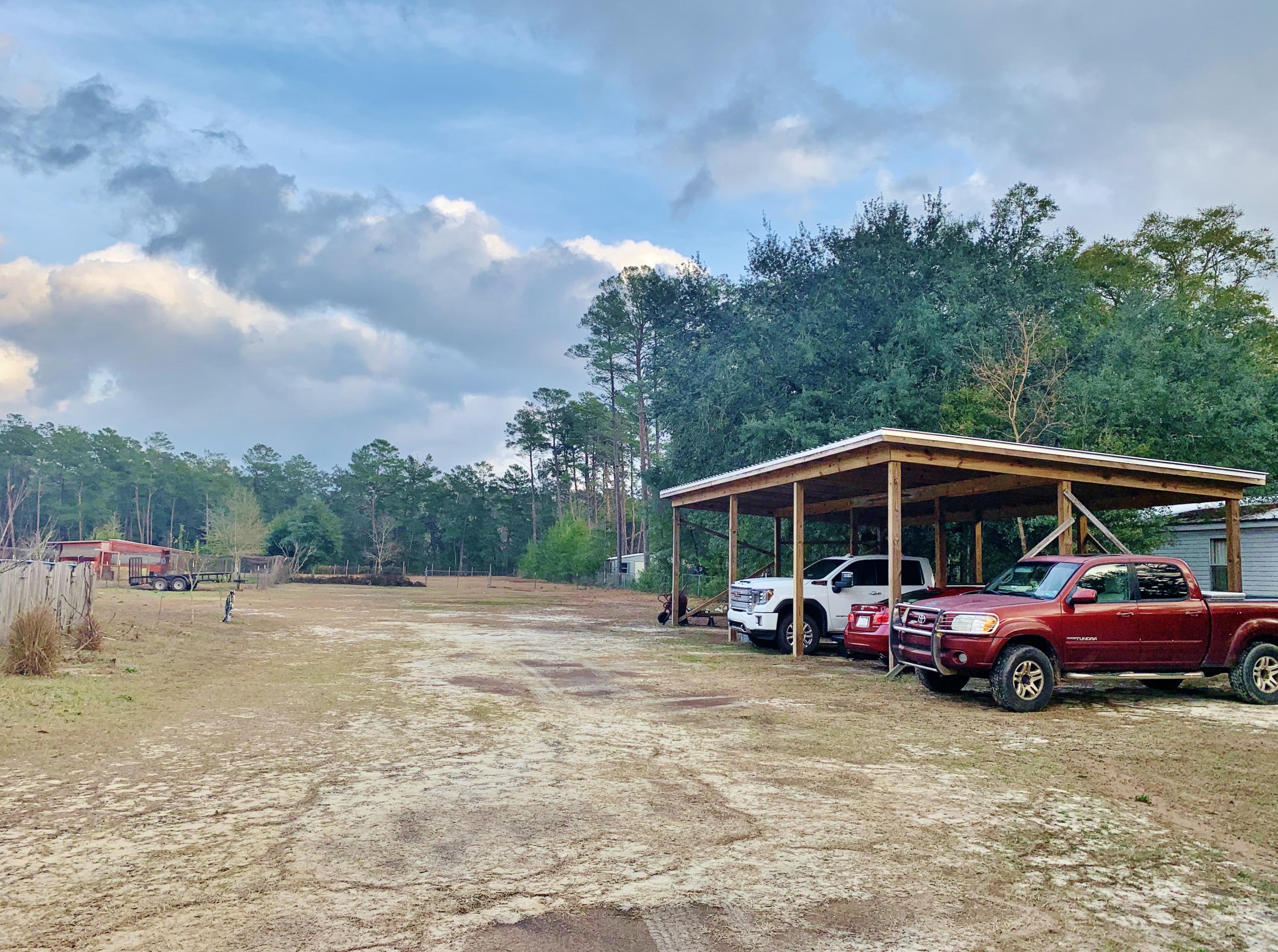 814 Site C-6 Road Freeport, FL 32439 - Photo 36 of 48 3 vehicle Pole Barn