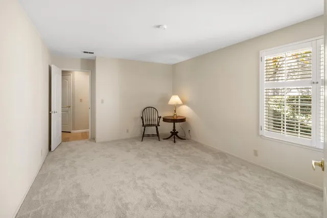 a view of a yard with an outdoor seating