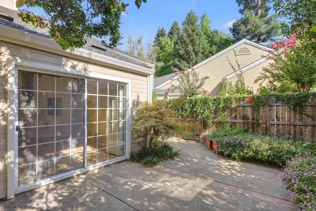 a view of a swimming pool with sitting area