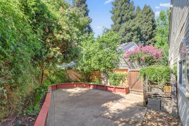 an aerial view of house with yard swimming pool and outdoor seating