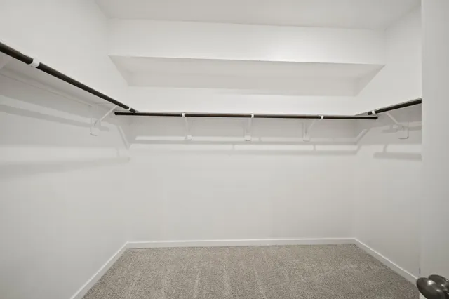 a view of an empty walk in closet