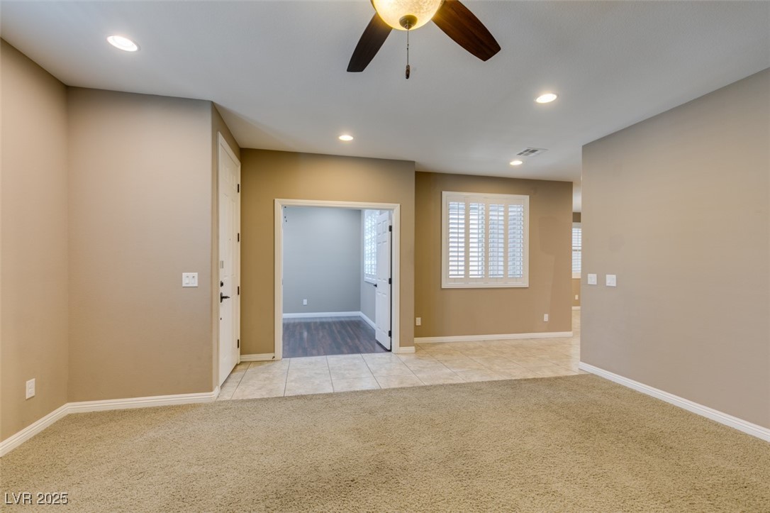 11063 Mt George Street Las Vegas, NV 89179 - Photo 11 of 49 Spare room featuring light colored carpet, recesse