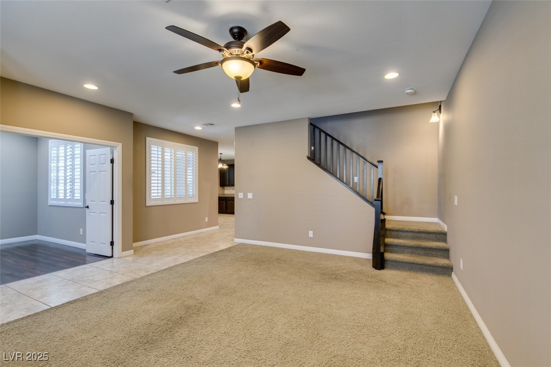 11063 Mt George Street Las Vegas, NV 89179 - Photo 12 of 49 Unfurnished living room featuring carpet floors, c