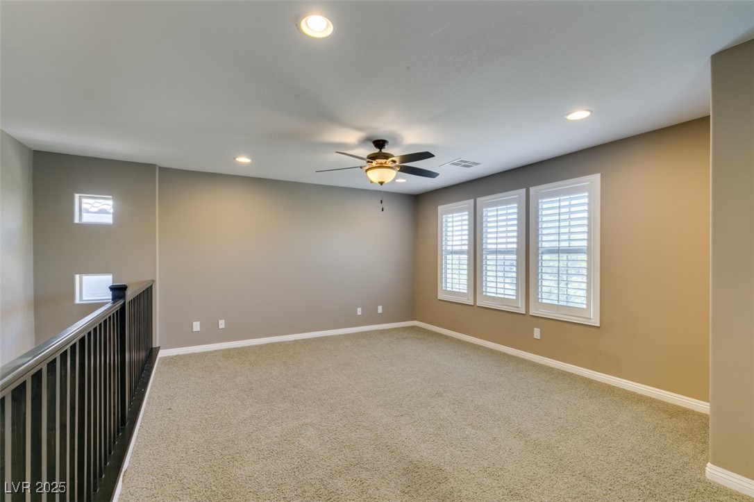 11063 Mt George Street Las Vegas, NV 89179 - Photo 30 of 49 Empty room featuring carpet flooring, recessed lig