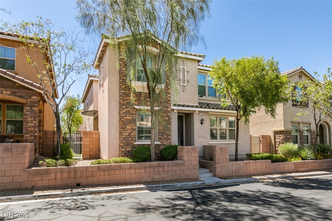 11063 Mt George Street Las Vegas, NV 89179 - Photo 3 of 49 Featuring stucco siding and a tiled roof