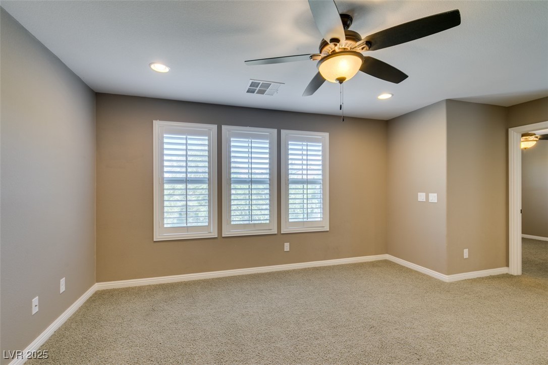 11063 Mt George Street Las Vegas, NV 89179 - Photo 31 of 49 Spare room with ceiling fan, carpet, and recessed