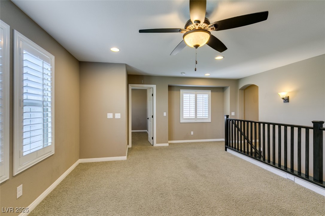 11063 Mt George Street Las Vegas, NV 89179 - Photo 32 of 49 Carpeted spare room featuring ceiling fan, recesse