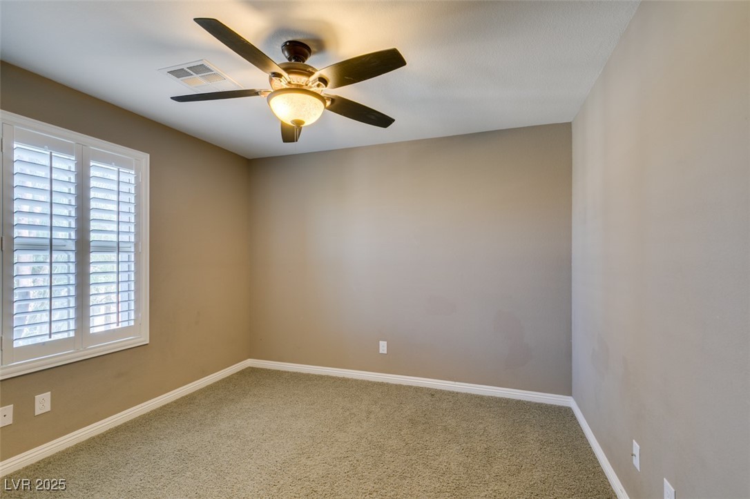 11063 Mt George Street Las Vegas, NV 89179 - Photo 33 of 49 Empty room featuring carpet floors and ceiling fan