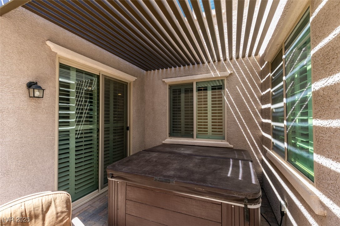 11063 Mt George Street Las Vegas, NV 89179 - Photo 45 of 49 Deck featuring a hot tub