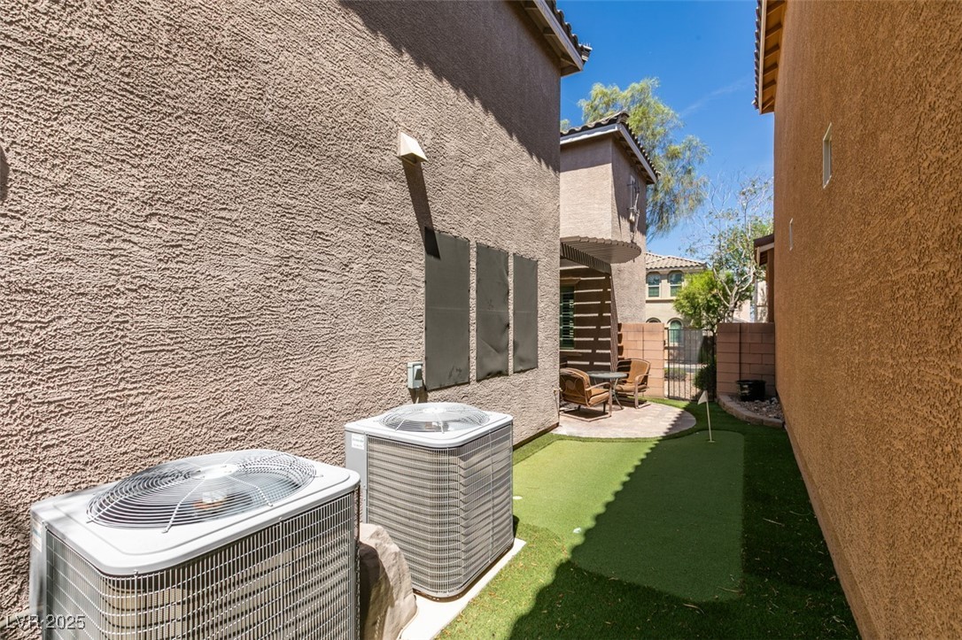11063 Mt George Street Las Vegas, NV 89179 - Photo 47 of 49 View of yard featuring a putting area