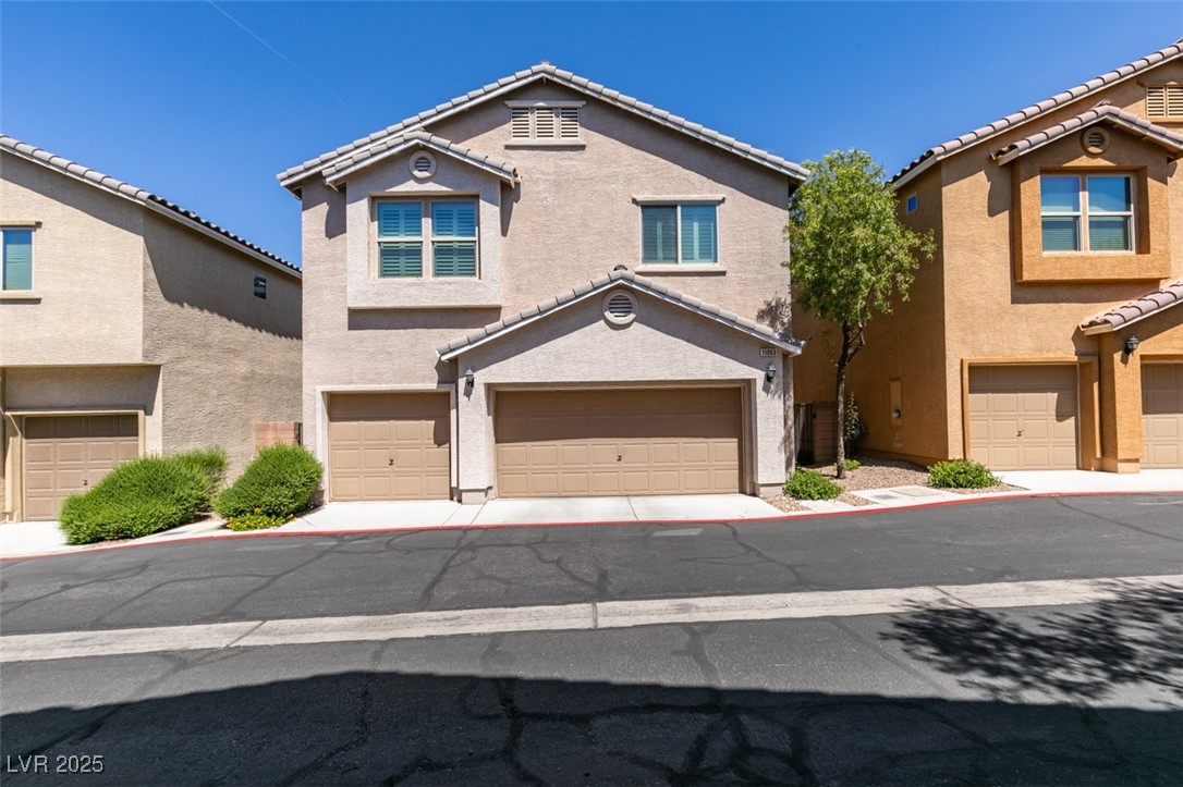 11063 Mt George Street Las Vegas, NV 89179 - Photo 48 of 49 View of front of property featuring a garage and s