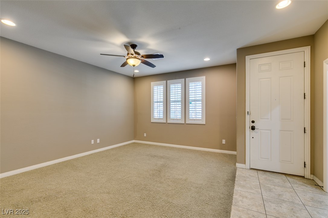 11063 Mt George Street Las Vegas, NV 89179 - Photo 7 of 49 Spare room with light colored carpet, recessed lig