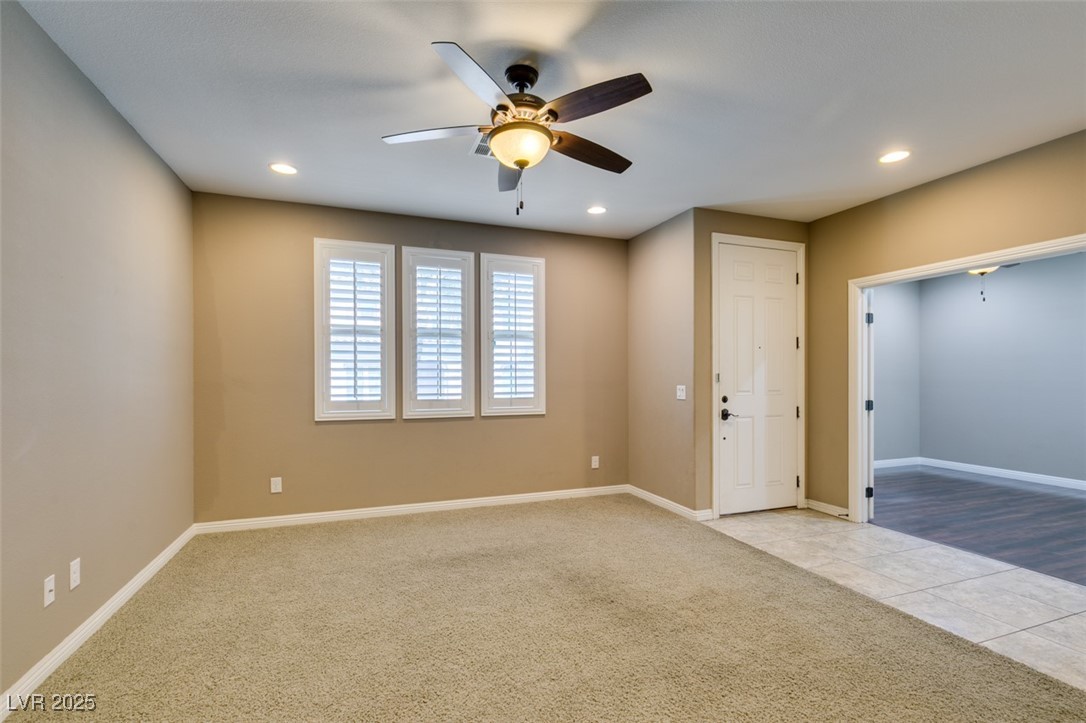 11063 Mt George Street Las Vegas, NV 89179 - Photo 9 of 49 Unfurnished room featuring ceiling fan, light colo
