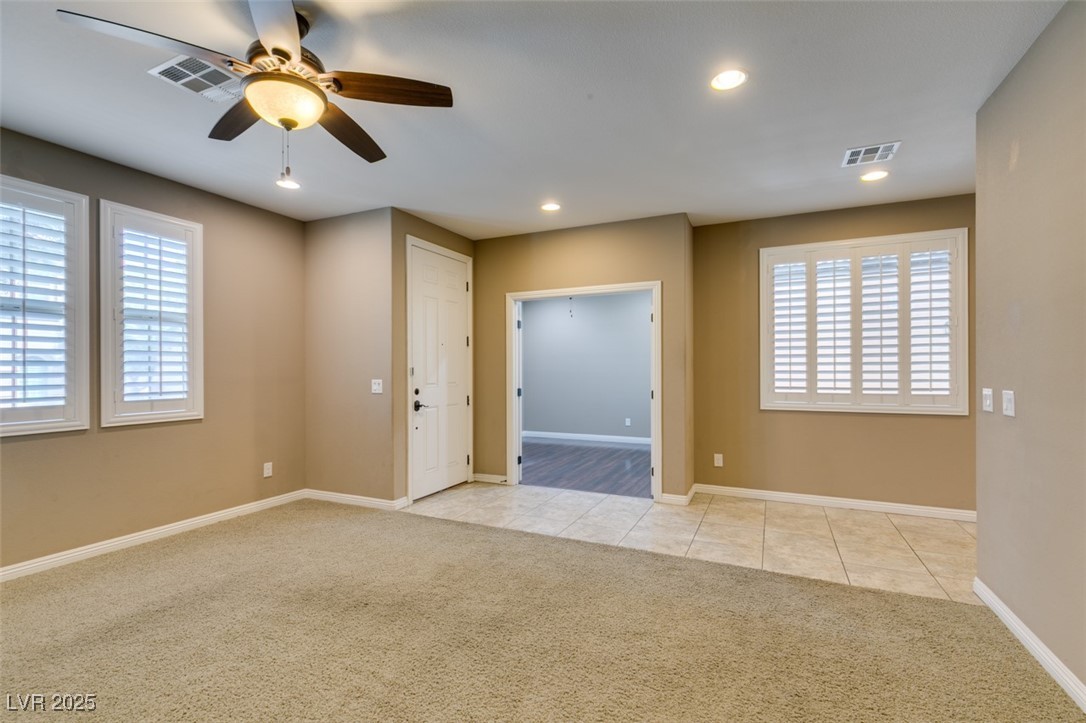 11063 Mt George Street Las Vegas, NV 89179 - Photo 10 of 49 Unfurnished room with light colored carpet, recess