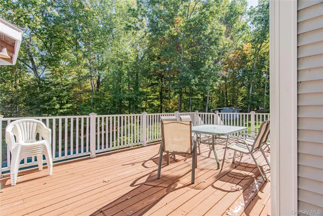a view of swimming pool with a patio