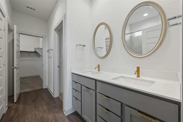 a bathroom with a shower and a toilet