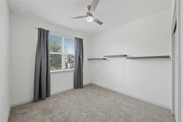 a view of a room with an empty space