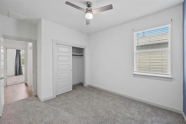 a bathroom with a sink toilet and mirror