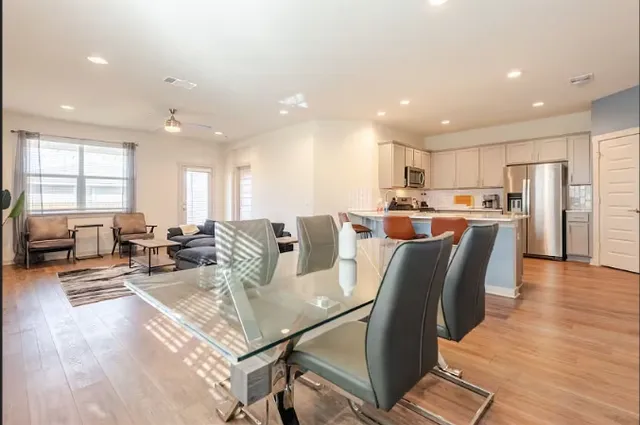 a view of kitchen with wooden floor and window
