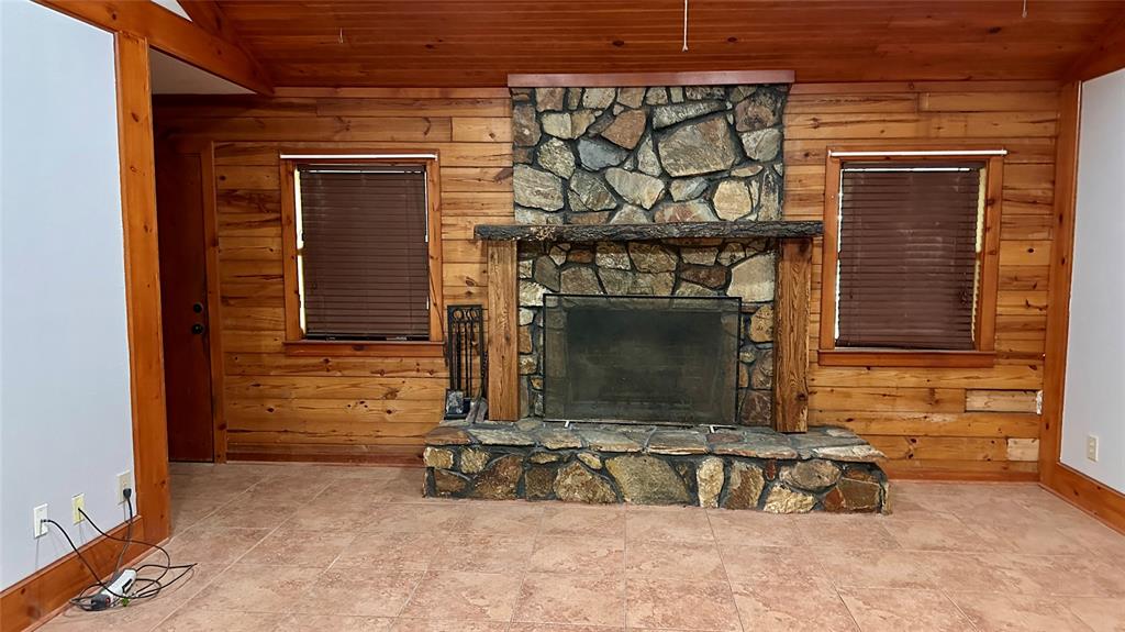 126 Garza Road Shady Shores, TX 76208 - Photo 2 of 19 a view of a fireplace with a door