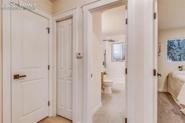 a bathroom with a sink mirror toilet and bathtub
