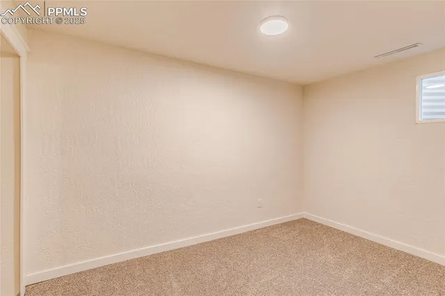 a bathroom with a granite countertop shower and a toilet