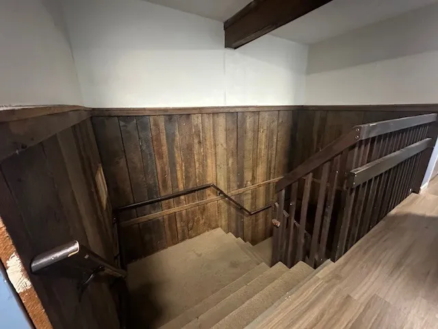 a view of balcony with wooden floor