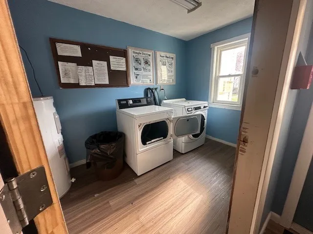 a utility room with a window dryer and washer