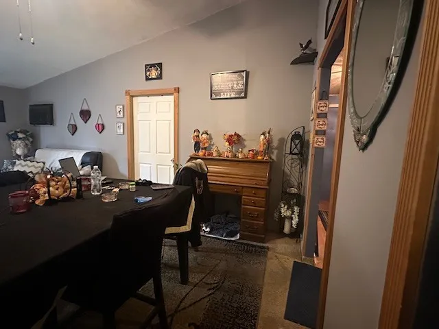 a view of a workspace with furniture and toys