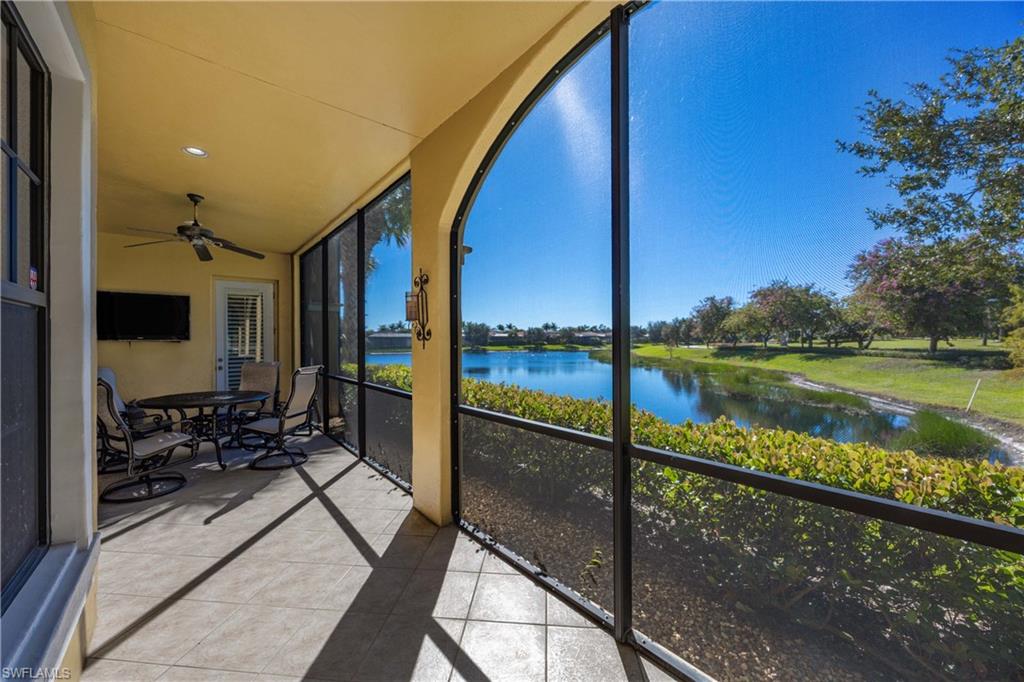 9105 Prima Way, Unit 102 Naples, FL 34113 - Photo 27 of 49 a view of swimming pool with outdoor seating