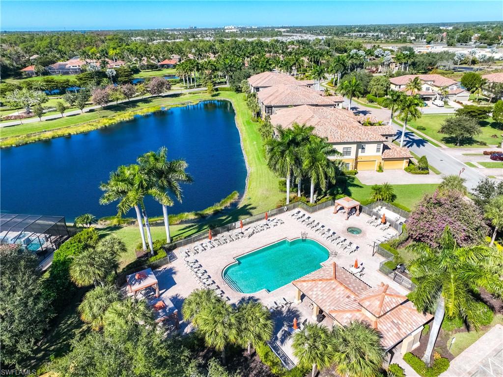 9105 Prima Way, Unit 102 Naples, FL 34113 - Photo 30 of 49 an aerial view of residential houses with outdoor space and swimming pool
