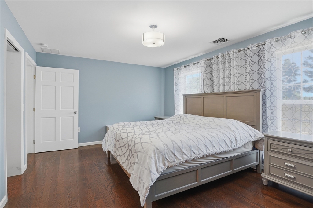 112 Pineland Avenue Worcester, MA 01604 - Photo 15 of 38 a bedroom with a bed and a window