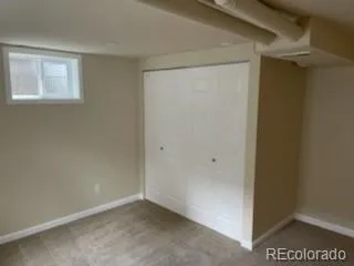 a bathroom with a toilet and a bathtub