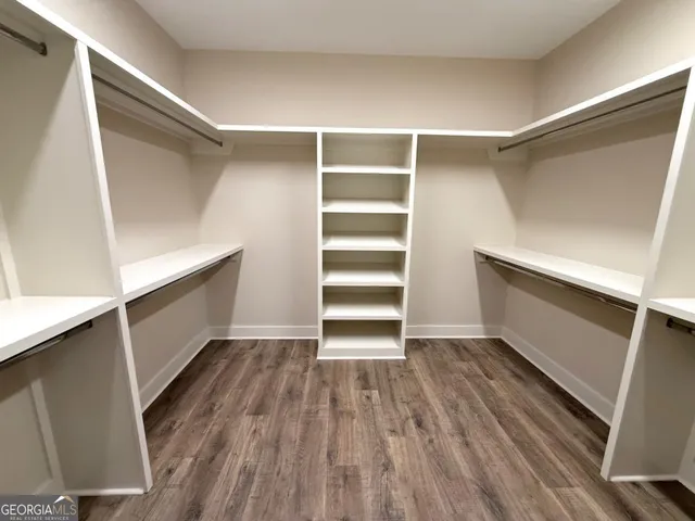 a view of an empty walk in closet