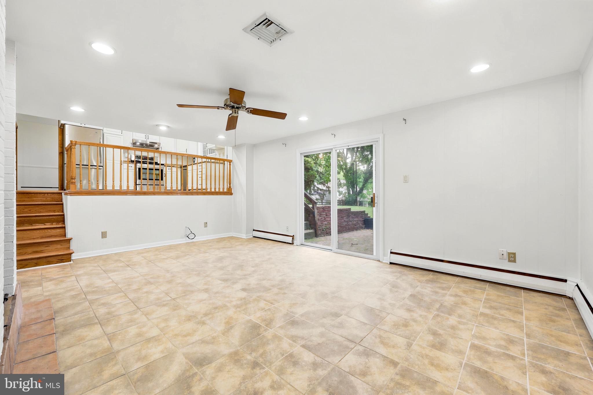 412 Yorkshire Road Bryn Mawr, PA 19010 - Photo 12 of 25 a view of an empty room with a window