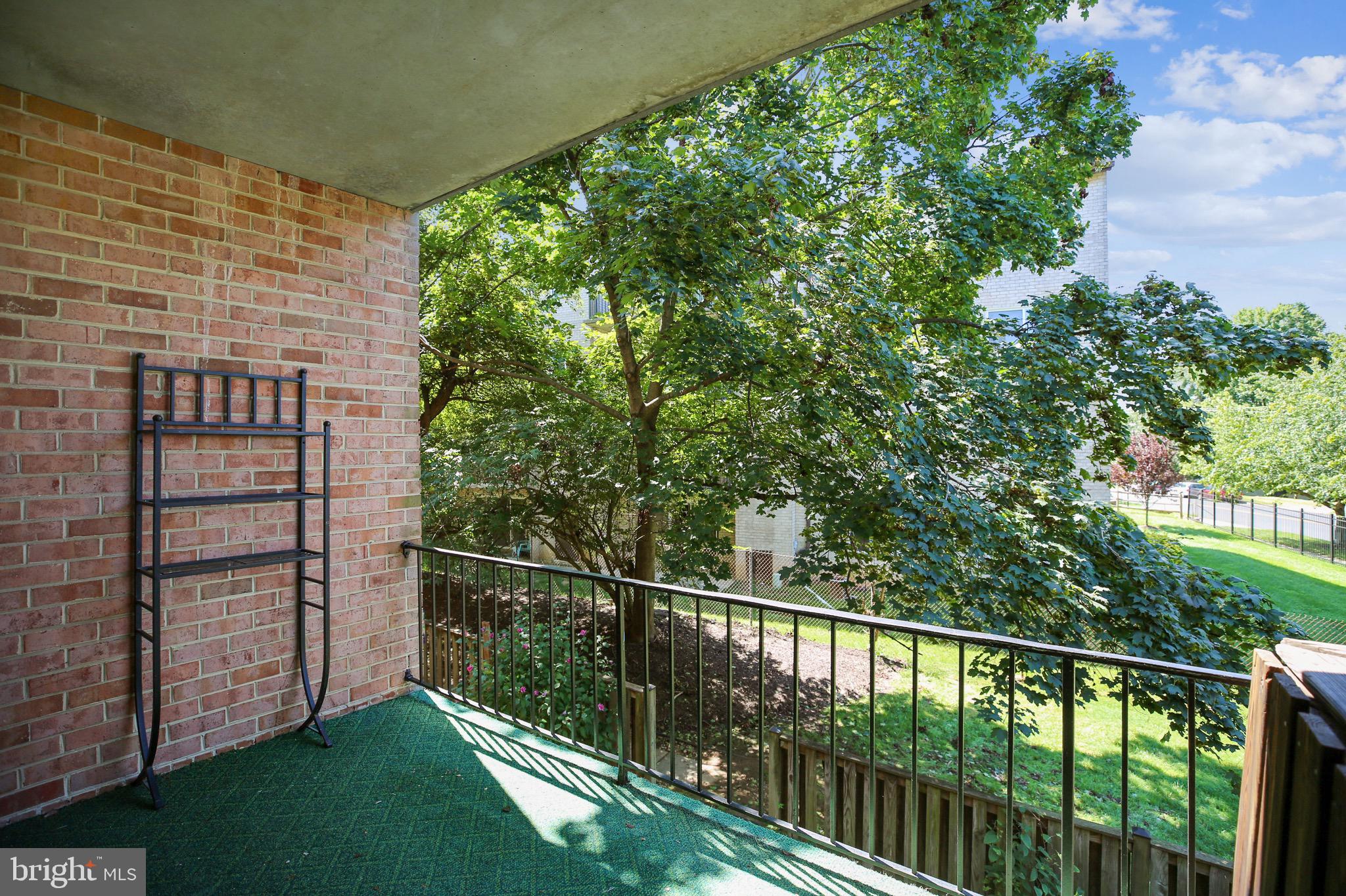 3380 Hewitt Avenue, Unit 202 Silver Spring, MD 20906 - Photo 11 of 14 Balcony Overlooking Trees