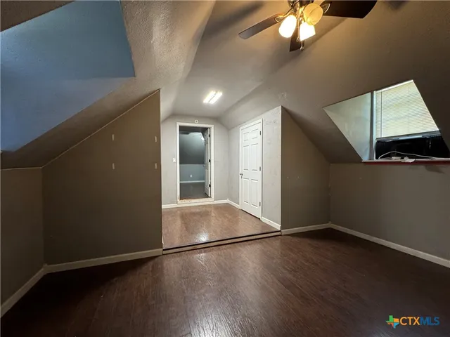 a view of a livingroom with wooden floor