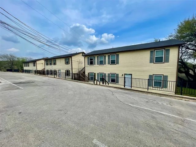 a kitchen with a refrigerator stove and sink