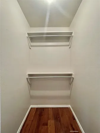 a view of small space with racks on the wall