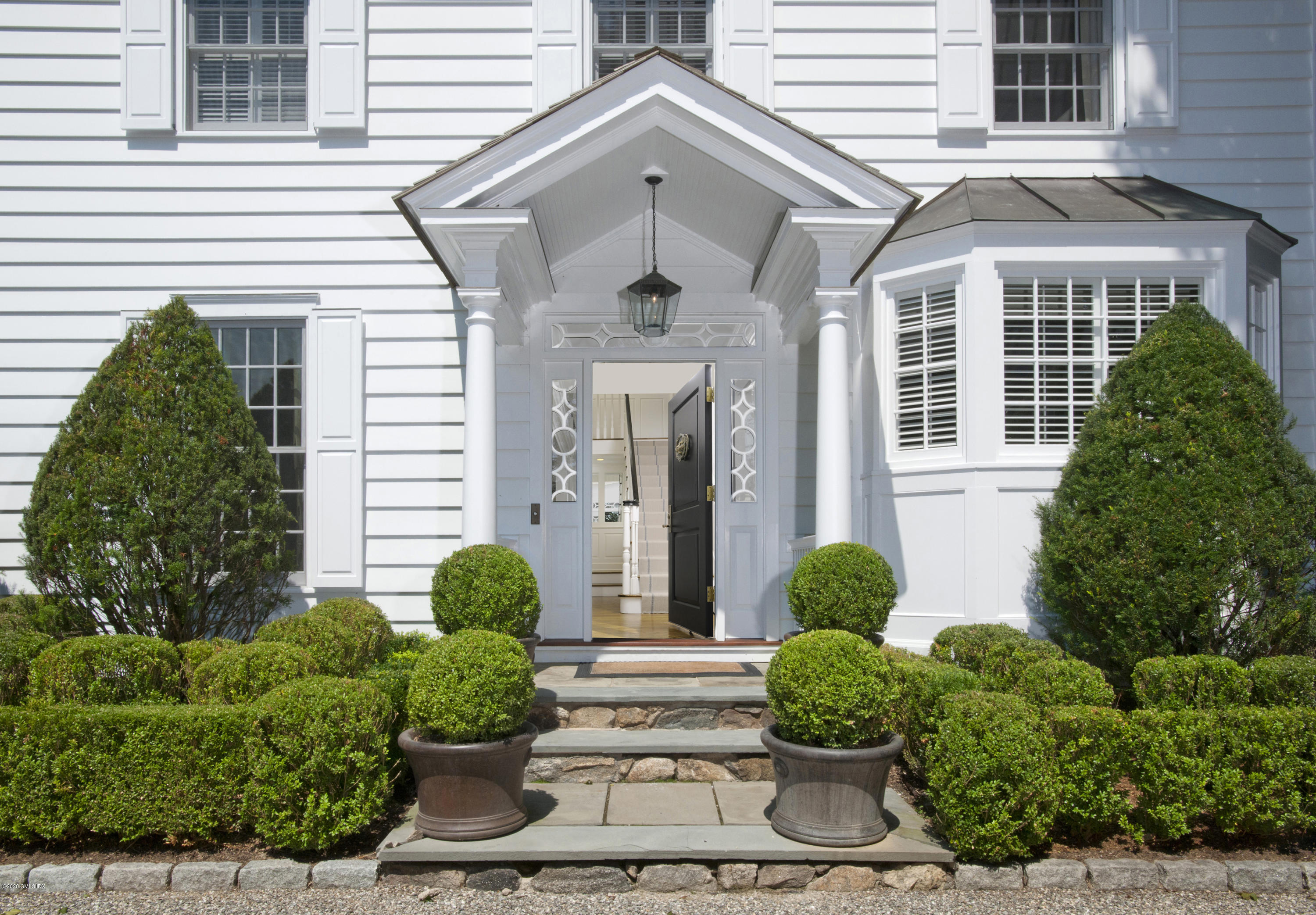 176 Stanwich Road Greenwich, CT 06830 - Photo 12 of 29 a front view of a house