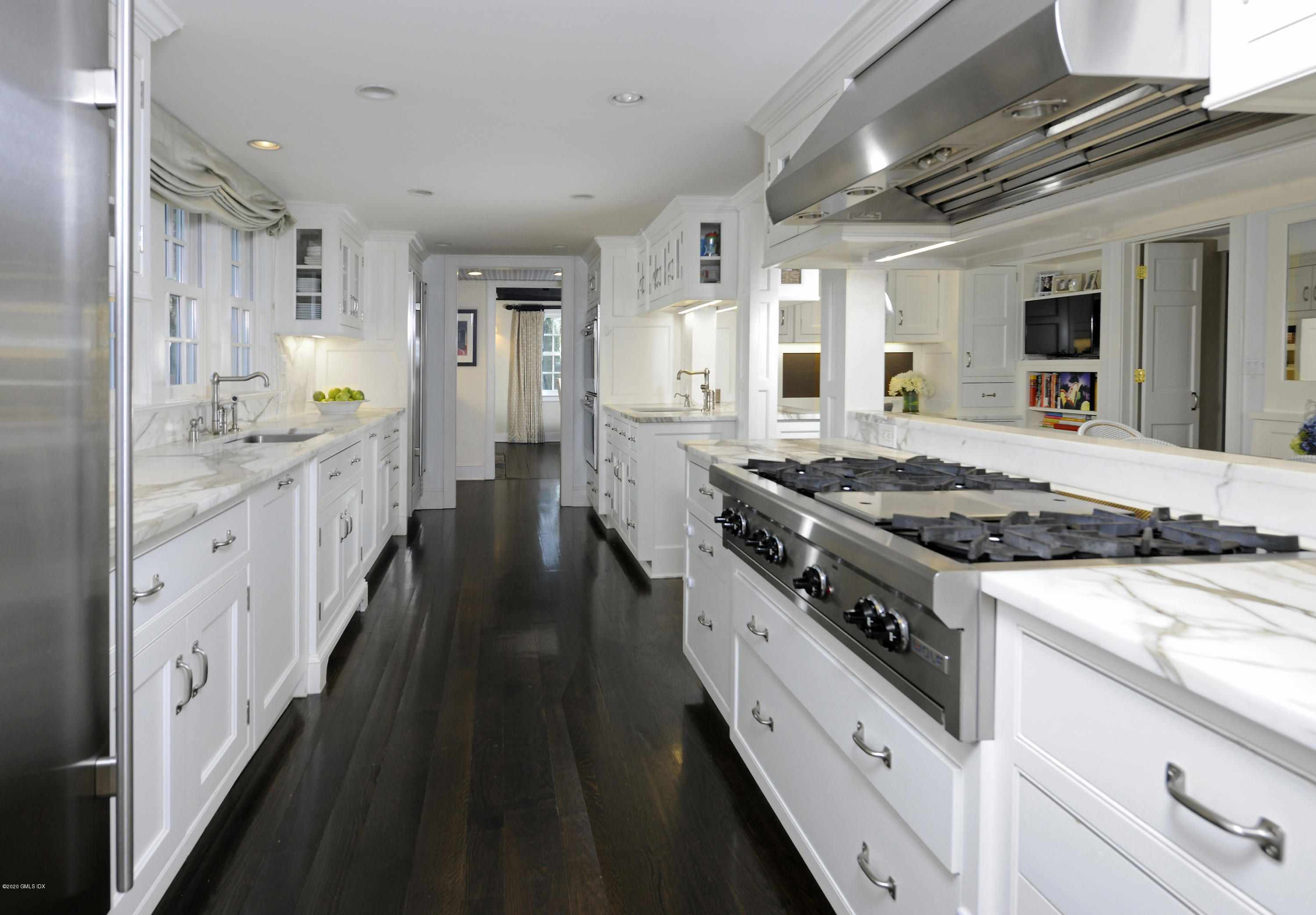 176 Stanwich Road Greenwich, CT 06830 - Photo 15 of 29 a open kitchen with stainless steel appliances granite countertop lots of counter top space and wooden floors