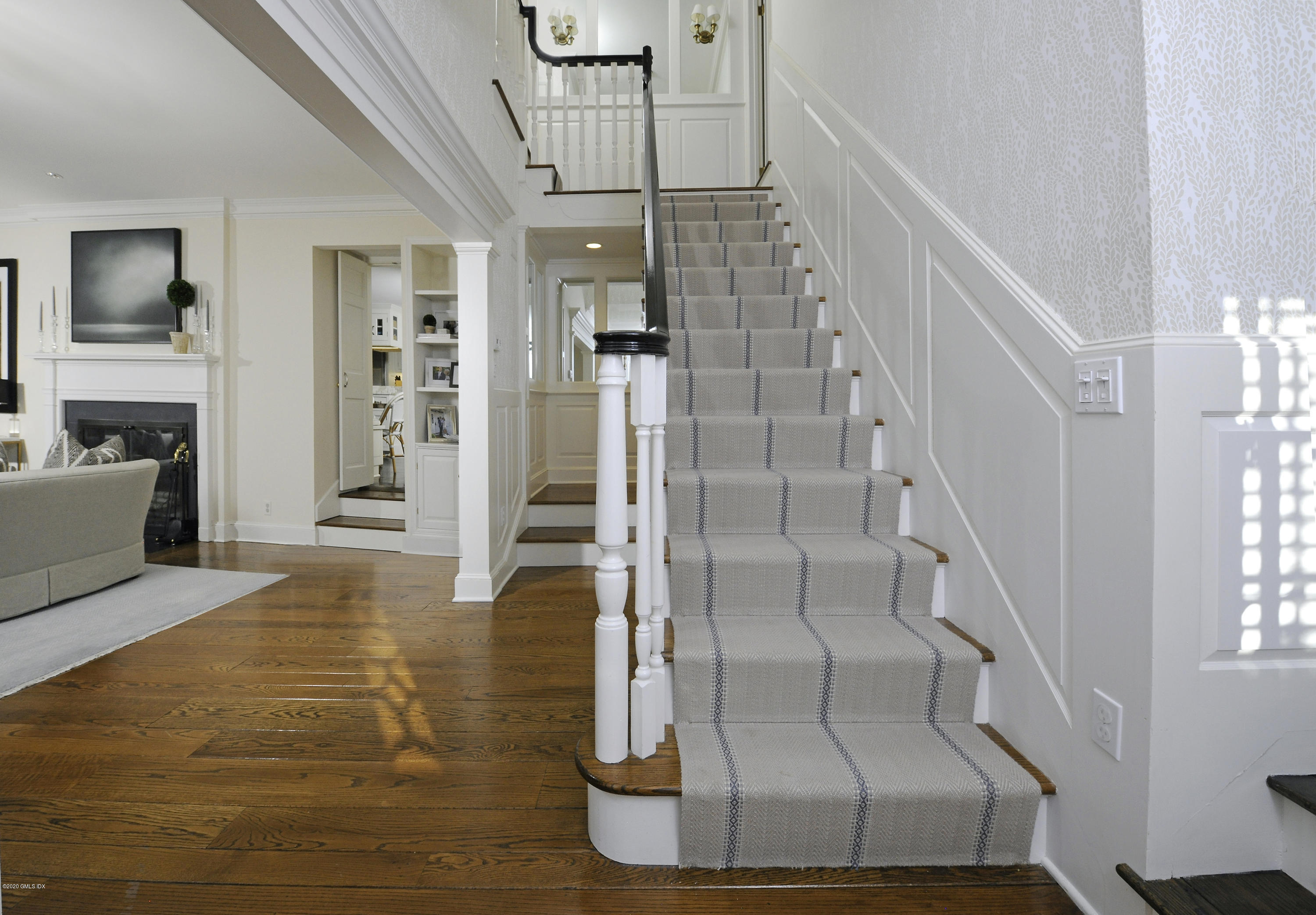 176 Stanwich Road Greenwich, CT 06830 - Photo 22 of 29 a view of entryway and hall with a dining table