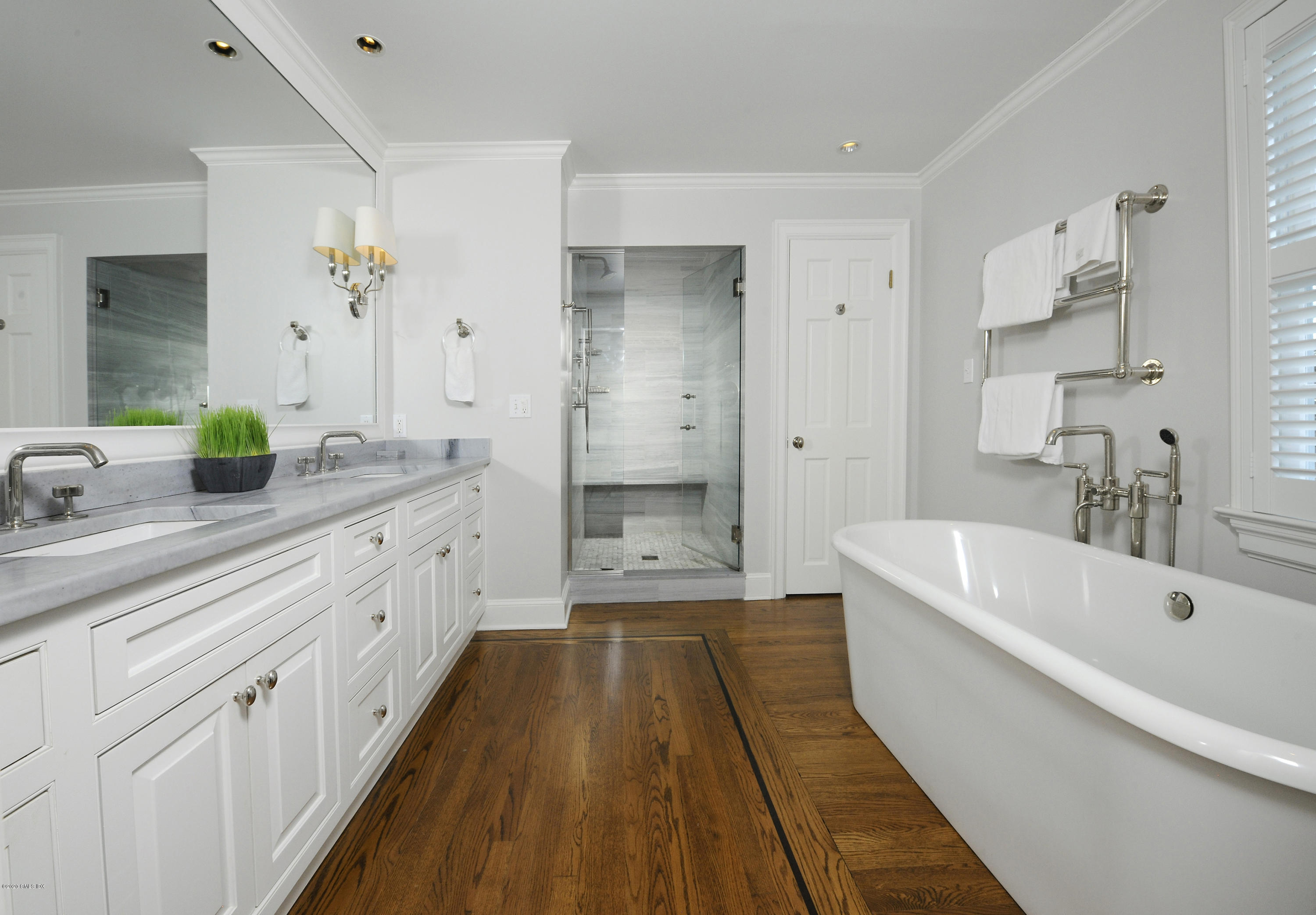176 Stanwich Road Greenwich, CT 06830 - Photo 24 of 29 a spacious bathroom with a tub sink and mirror