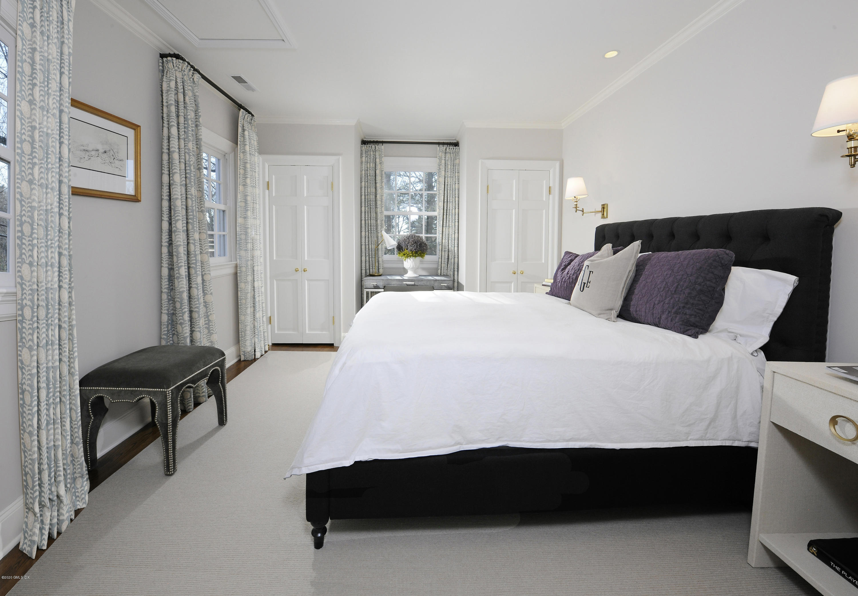 176 Stanwich Road Greenwich, CT 06830 - Photo 25 of 29 a bedroom with a bed and wooden floor