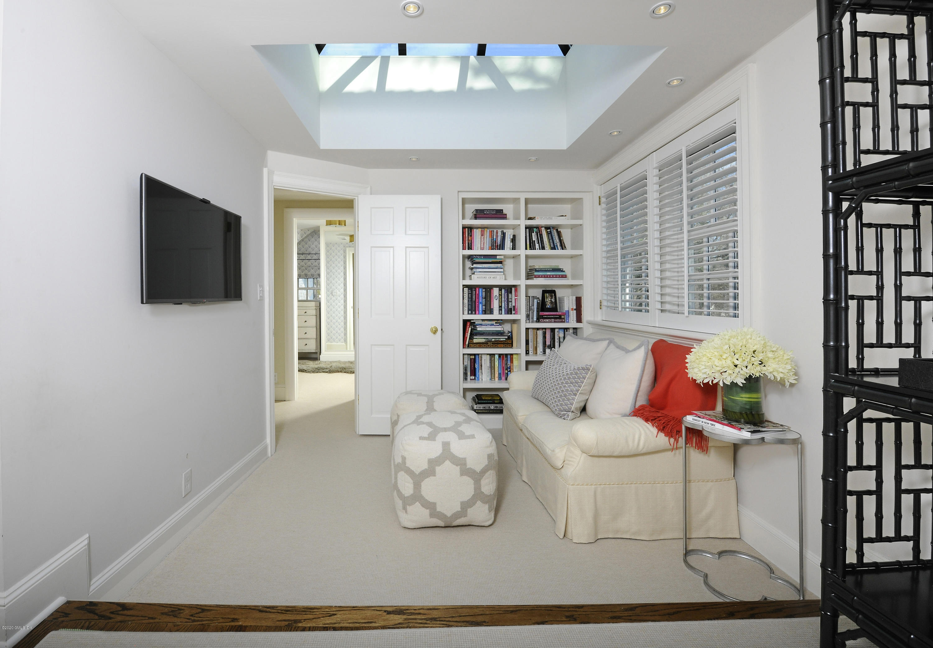 176 Stanwich Road Greenwich, CT 06830 - Photo 26 of 29 a living room with furniture and a flat screen tv