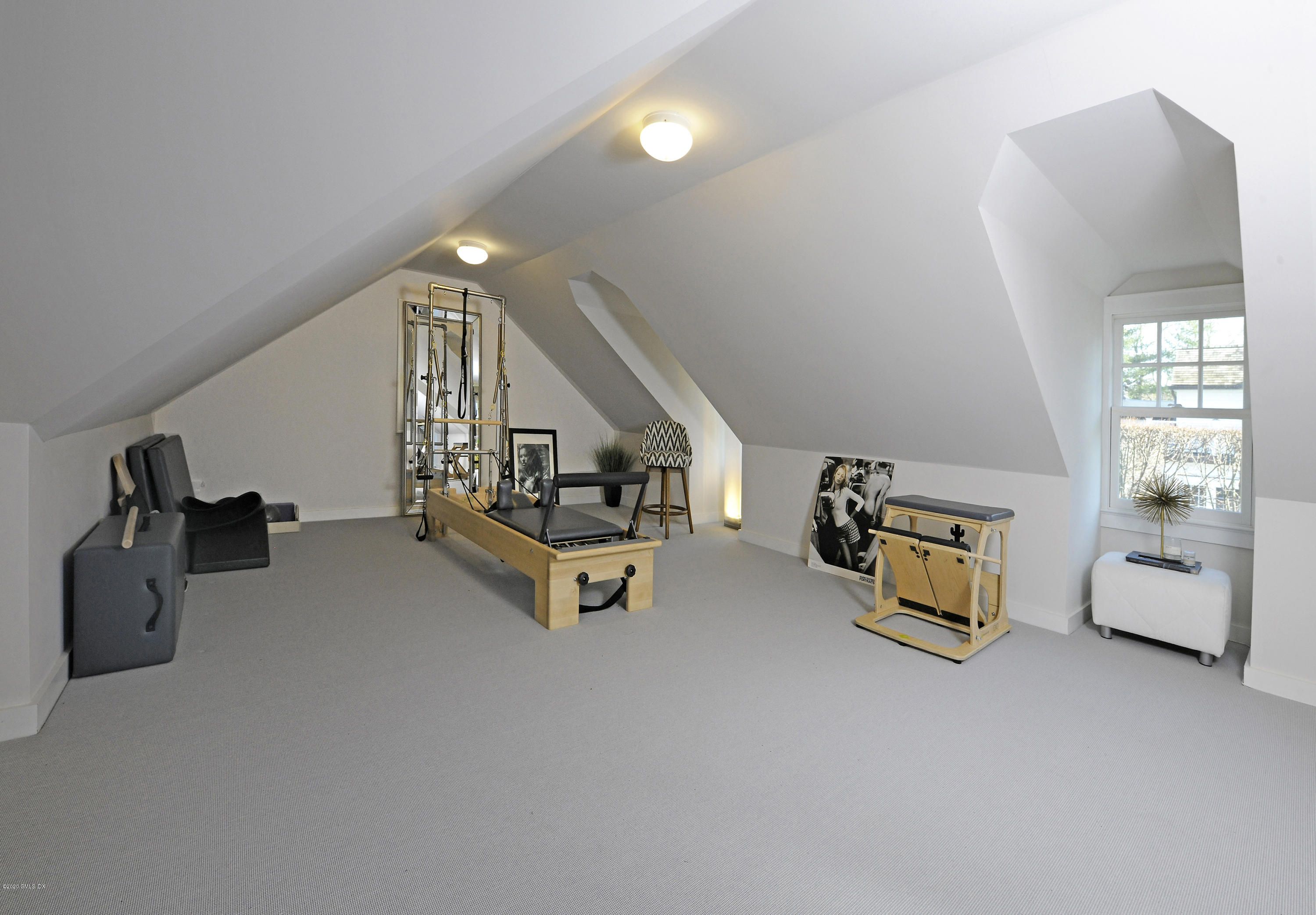 176 Stanwich Road Greenwich, CT 06830 - Photo 28 of 29 a living room with furniture and a chandelier