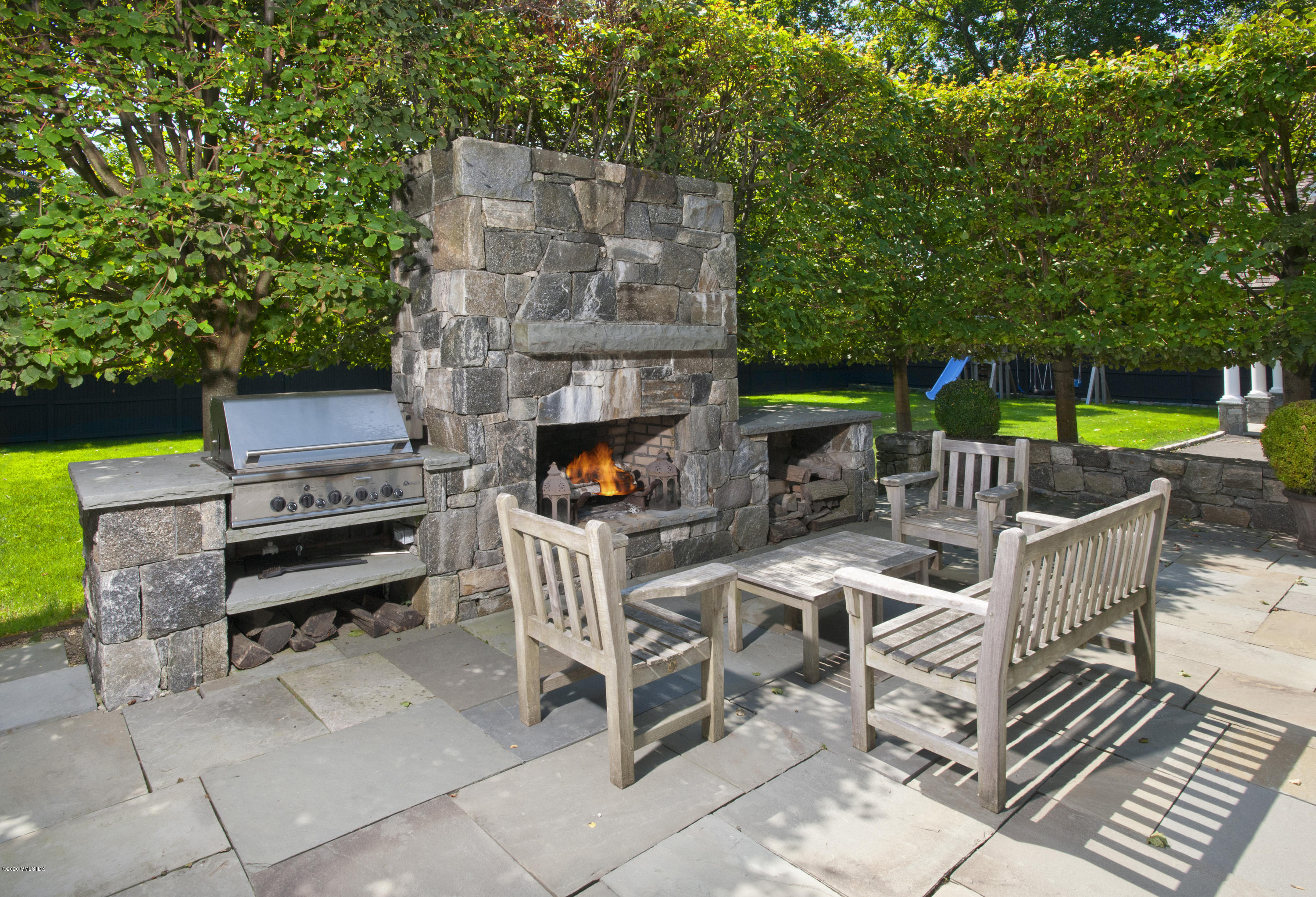176 Stanwich Road Greenwich, CT 06830 - Photo 6 of 29 a view of a terrace with furniture and a garden