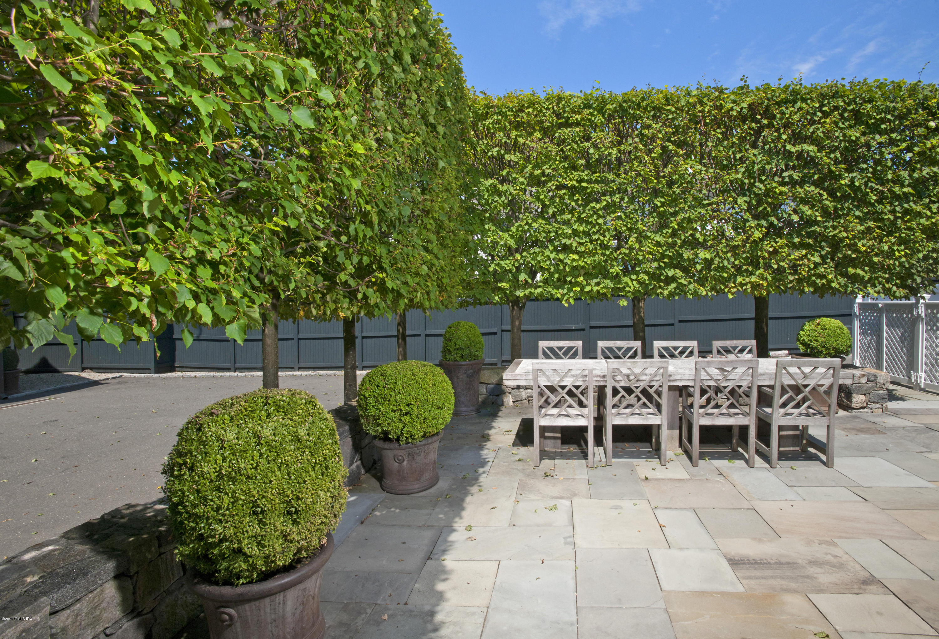 176 Stanwich Road Greenwich, CT 06830 - Photo 7 of 29 a view of a tables and chairs in the patio