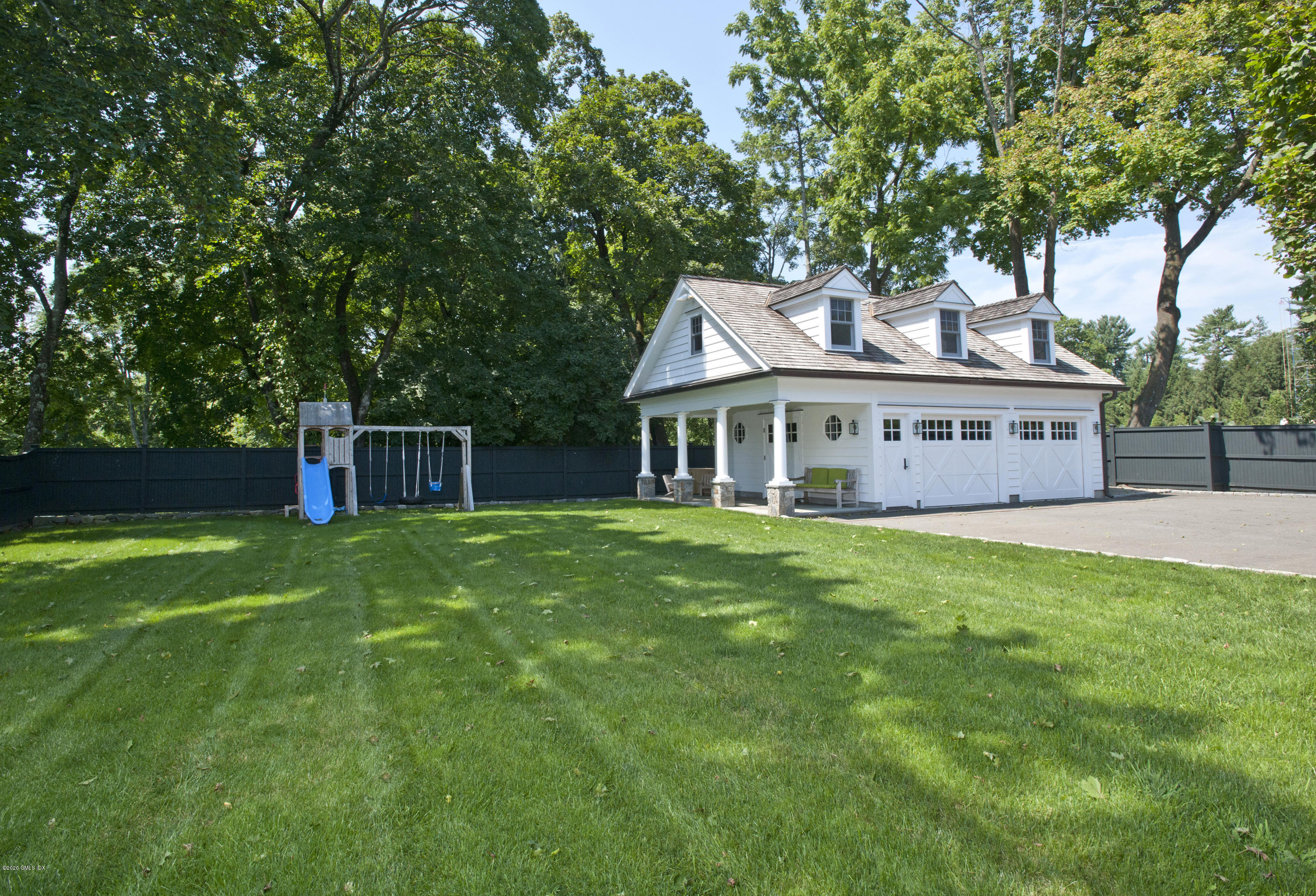 176 Stanwich Road Greenwich, CT 06830 - Photo 10 of 29 a view of a house with a yard